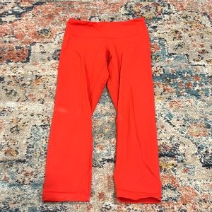 lululemon neon orange capri leggings